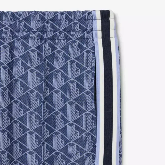 Pantalones de chándal acampanados con monograma para mujer