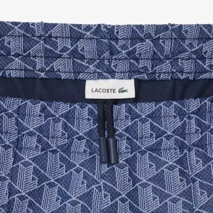 Pantalones de chándal acampanados con monograma para mujer