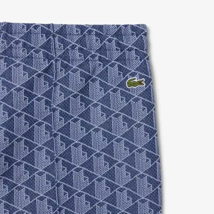 Pantalones de chándal acampanados con monograma para mujer