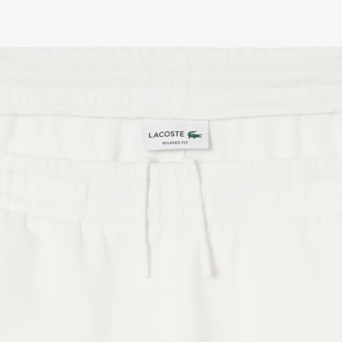 Pantalones de chándal de felpa con insignia para hombre
