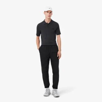 Pantalones de chándal ligeros y repelentes al agua para hombre