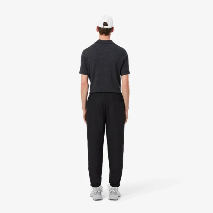 Pantalones de chándal ligeros y repelentes al agua para hombre