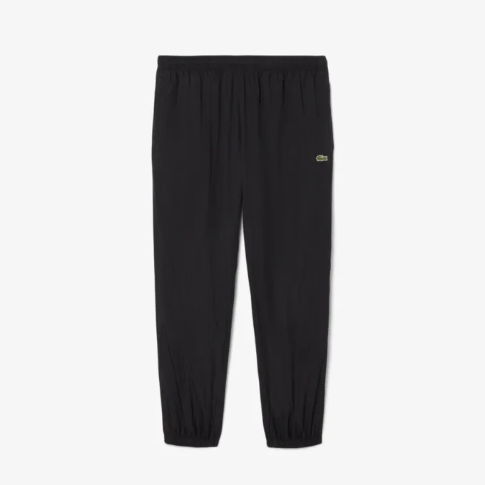 Pantalones de chándal ligeros y repelentes al agua para hombre