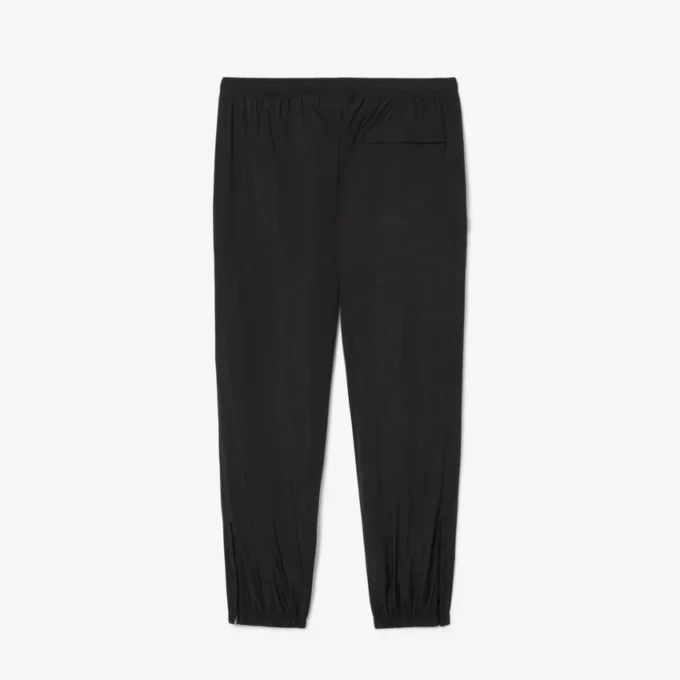 Pantalones de chándal ligeros y repelentes al agua para hombre