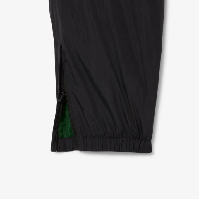 Pantalones de chándal ligeros y repelentes al agua para hombre