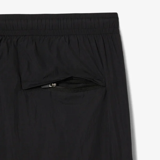 Pantalones de chándal ligeros y repelentes al agua para hombre