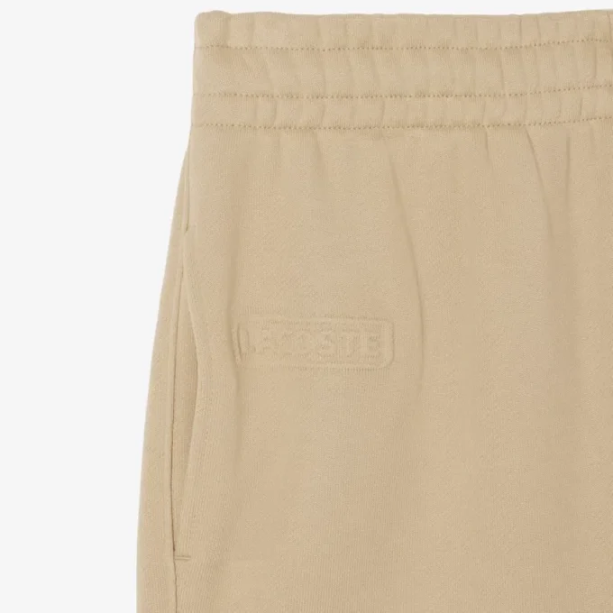 Pantalones de felpa con logotipo en relieve para mujer