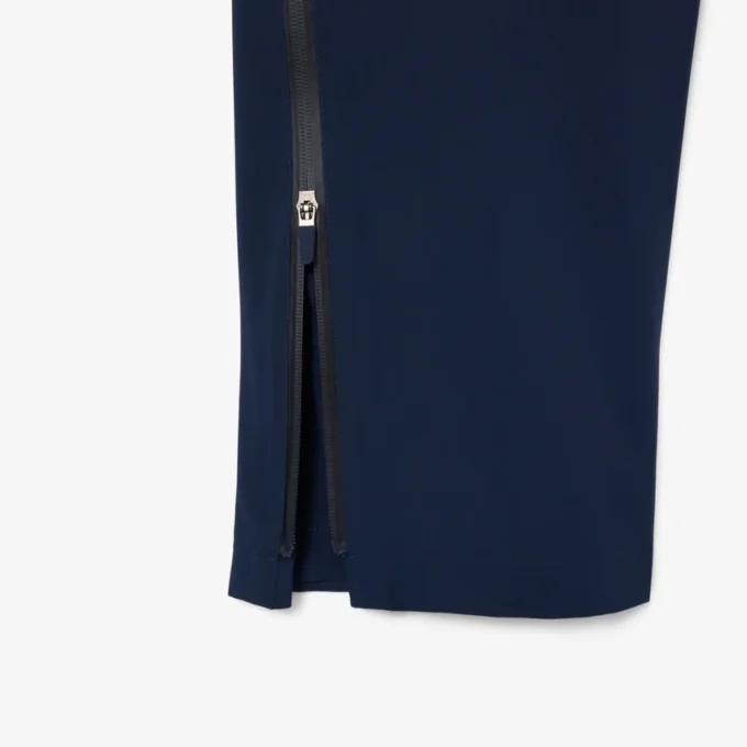 Pantalones de golf elásticos de tejido repelente al agua para hombre