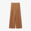 Pantalones de lana entallados de corte amplio de pasarela