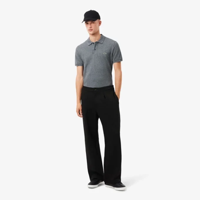 Pantalones de piqué con pliegues de corte holgado para hombre
