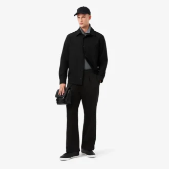 Pantalones de piqué con pliegues de corte holgado para hombre
