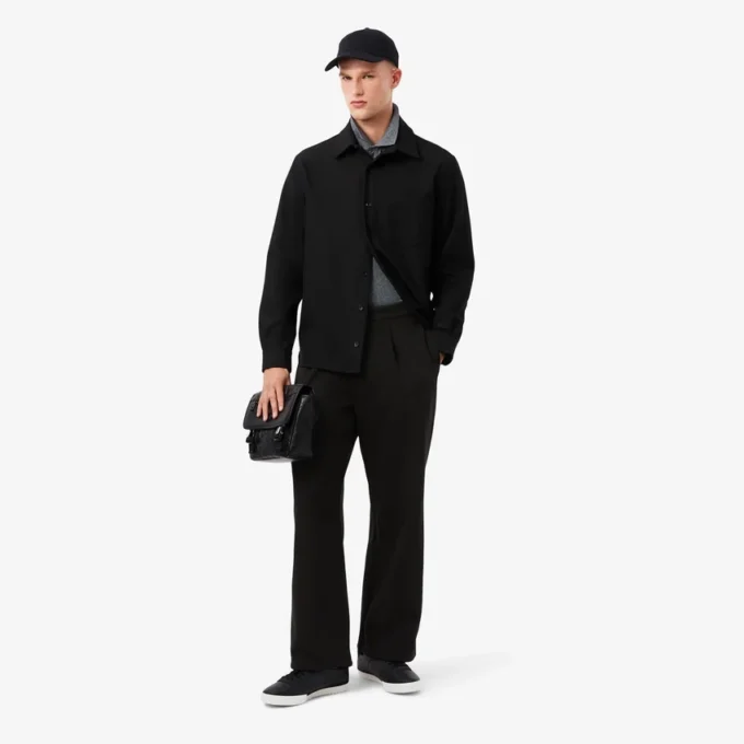 Pantalones de piqué con pliegues de corte holgado para hombre
