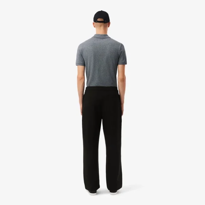 Pantalones de piqué con pliegues de corte holgado para hombre
