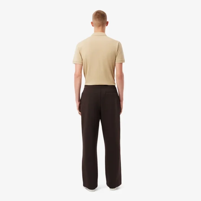 Pantalones de piqué con pliegues de corte holgado para hombre