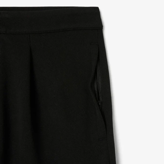 Pantalones de piqué con pliegues de corte holgado para hombre