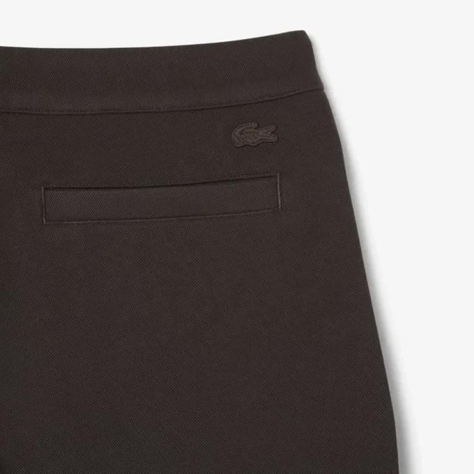 Pantalones de piqué con pliegues de corte holgado para hombre