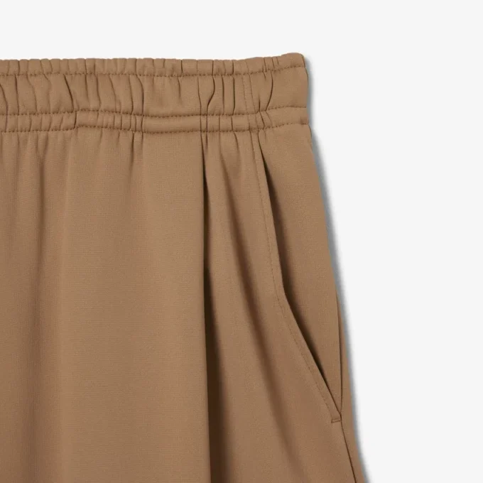 Pantalones joggers de satén plisados de la colección Runway