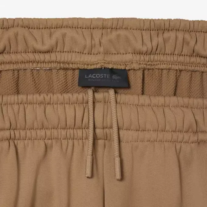Pantalones joggers de satén plisados de la colección Runway