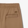 Pantalones joggers de satén plisados de la colección Runway
