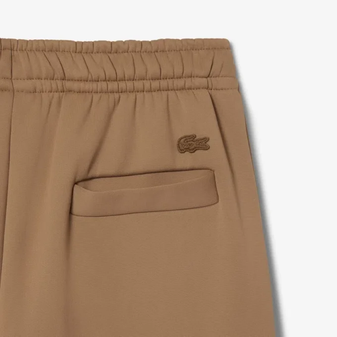 Pantalones joggers de satén plisados de la colección Runway