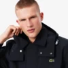 Parka con capucha repelente al agua de largo medio para hombre