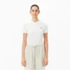 Polo de algodón elástico L.12.12 de corte entallado para mujer
