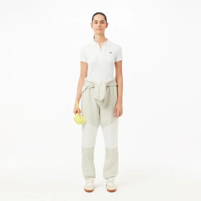 Polo de algodón elástico L.12.12 de corte entallado para mujer