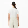 Polo de algodón elástico L.12.12 de corte entallado para mujer