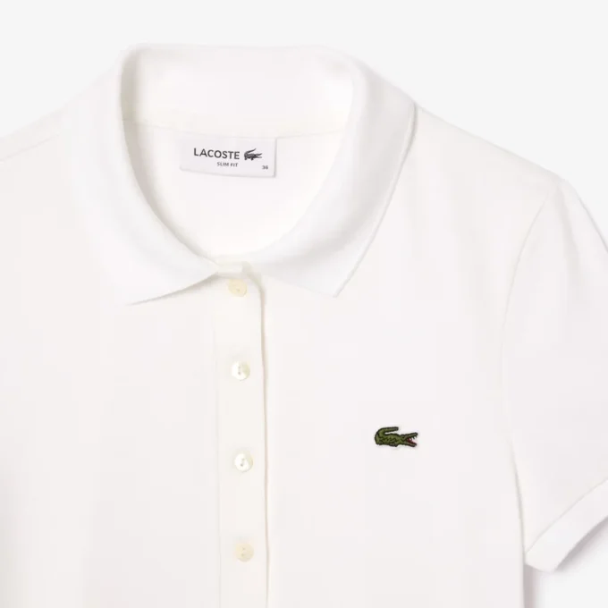 Polo de algodón elástico L.12.12 de corte entallado para mujer