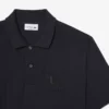 Polo de corte clásico con detalle bordado y tejido Petit Piqué