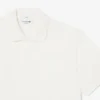 Polo de corte clásico con logotipo en relieve