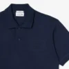 Polo de corte clásico con logotipo en relieve