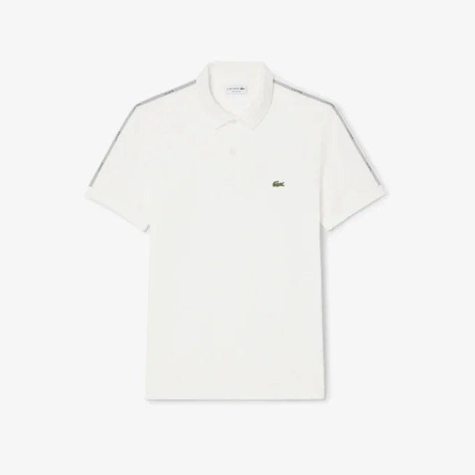 Polo de corte regular con rayas y logotipo