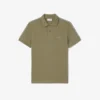 Polo de corte regular con rayas y logotipo