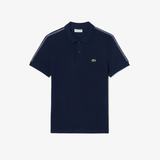 Polo de corte regular con rayas y logotipo