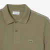 Polo de corte regular con rayas y logotipo