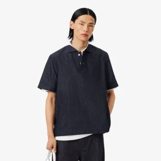 Polo de denim de corte holgado de pasarela