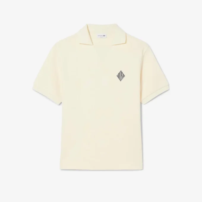 Polo de felpa de corte holgado con detalle de insignia