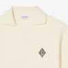 Polo de felpa de corte holgado con detalle de insignia