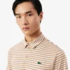 Polo de golf a rayas Ultra Dry de corte regular