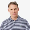 Polo de golf a rayas Ultra Dry de corte regular