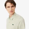 Polo de golf a rayas Ultra Dry de corte regular