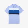 Polo de golf de corte regular para hombre con bloques de color
