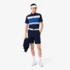 Polo de golf de corte regular para hombre con bloques de color