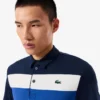 Polo de golf de corte regular para hombre con bloques de color