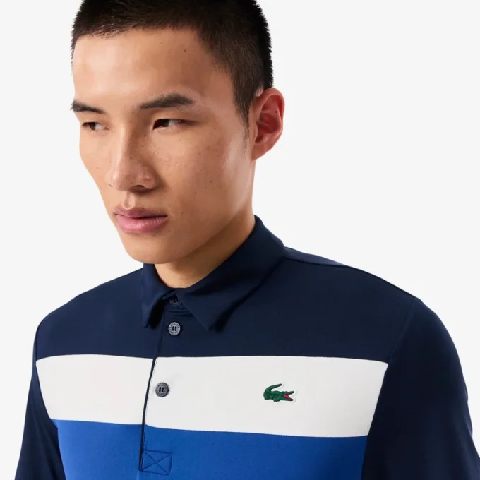 Polo de golf de corte regular para hombre con bloques de color