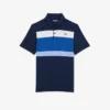Polo de golf de corte regular para hombre con bloques de color