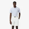 Polo de golf de mini piqué con regulación térmica