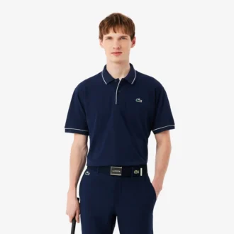 Polo de golf de mini piqué con regulación térmica