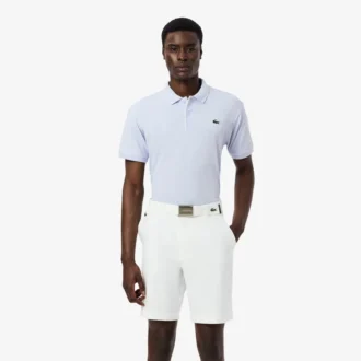 Polo de golf de mini piqué con regulación térmica